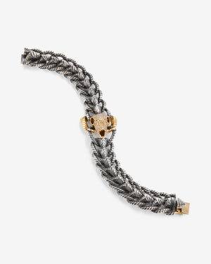 Stephen Webster Rams Head bracelet — 18 ct yellow gold skull-head centrepiece and polished silver/gold links, detail view.