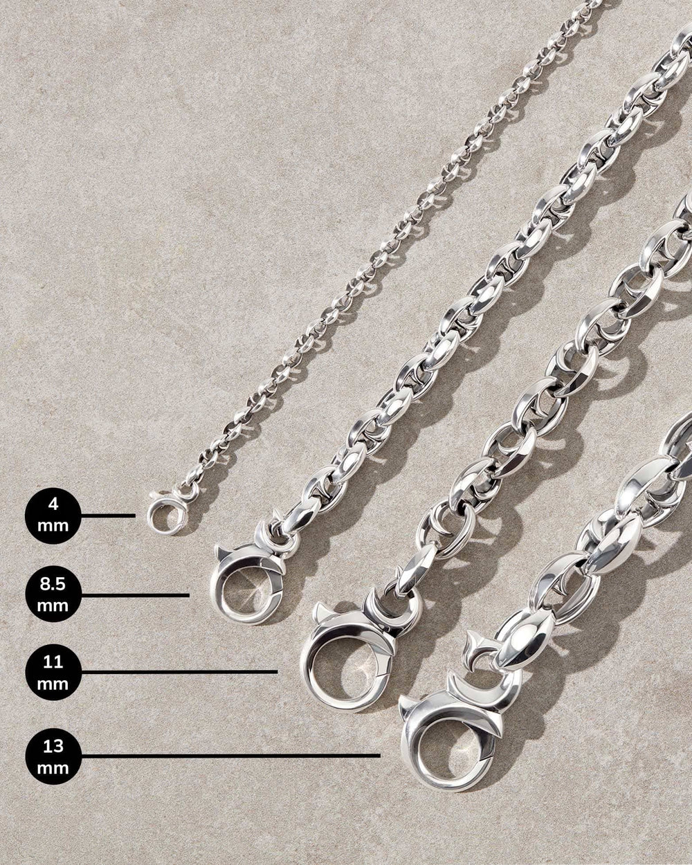 Men’s black rhodium sterling silver Thorn Medium Oval bracelet by Stephen Webster with bold thorn-inspired oval links