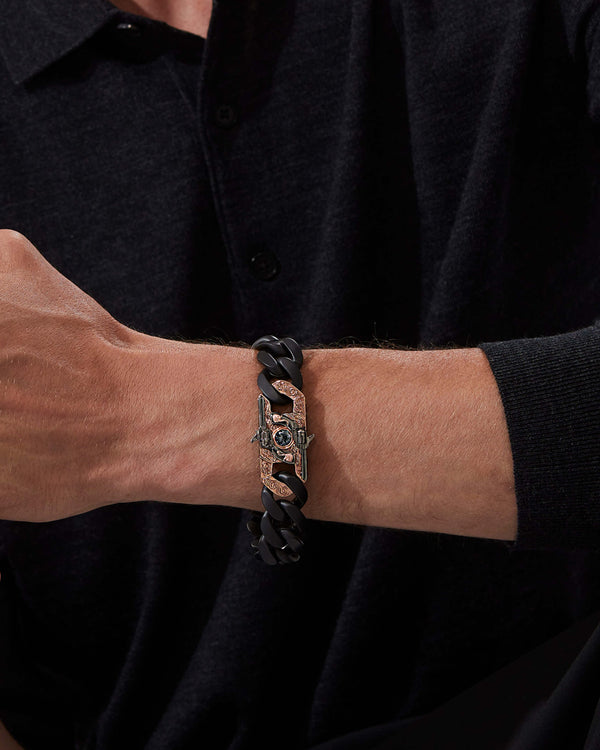 Model wearing Stephen Webster Wrist Full of Dollars clasp in rose gold & sterling silver with central grey spinel and mother of pearl back plate