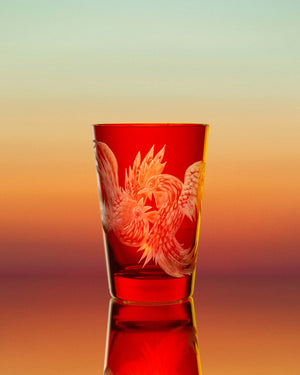 Stephen Webster x Artěl Cock Fight Smoke Crystal Tumbler on Artistic Backdrop Showcasing Handcrafted Crystal Detail