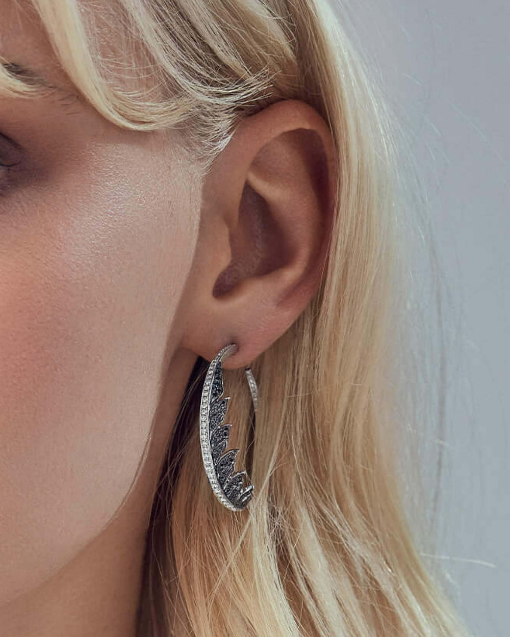 Black Diamond Pavé Plume Hoop Earrings in 18ct white gold with dramatic feather-inspired design and black diamonds