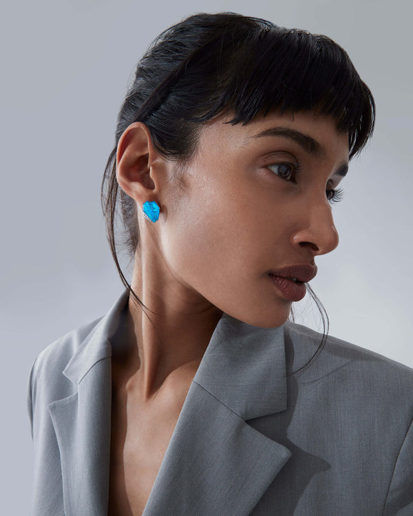 Black opalescent eye Crystal Haze shard cuff earrings worn on the ear in 18ct white gold