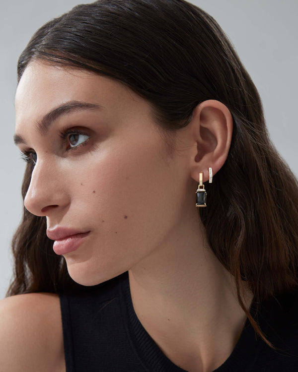 Chrysolemon Crystal Haze and diamonds small twister earrings worn on the ear in 18ct yellow gold