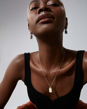 Chrysolemon Obsidian Crystal Haze and diamond twister pendant styled with other Stephen Webster Crystal Haze jewellery