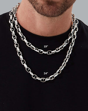 Close-up of model wearing two different length Classic Link Chain 11 mm sterling silver layered
