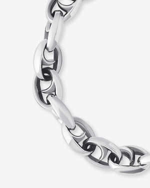 Close-up detail of the thorn-inspired medium oval links and polished sterling silver finish on Stephen Webster bracelet