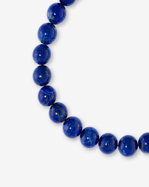 Close-up of the blue lapis gemstone beads and polished sterling silver Thorn links on Stephen Webster Thorn Beaded Bracelet