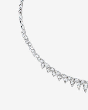 Close-up of white diamond pavé and feather-inspired detailing on White Gold Tail Feather Collar