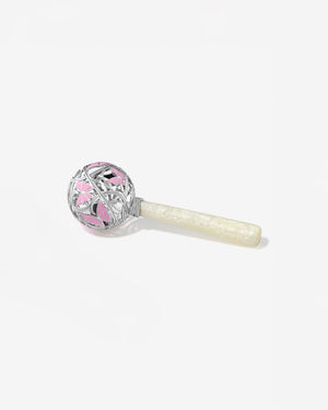 'Cry By Night' Rattle' in sterling silver pink enamel butterfly design, thorn-inspired openwork and mother-of-pearl handle - side view