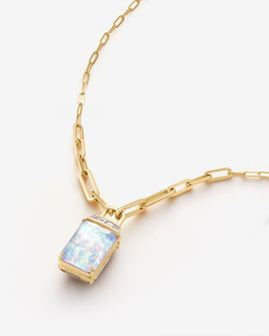 Side view of Crystal Haze and diamond tablet twister pendant in 18ct yellow gold