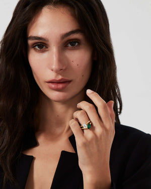 Stephen Webster Duo Band Rings worn on hand in 18K yellow gold with pear-shape white diamond, pear-shape emerald and white diamond pavé
