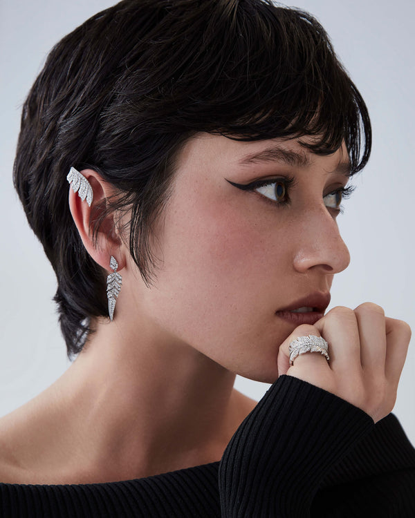 Eternal Plume Band Ring styled with Stephen Webster Magnipheasant collection jewellery showcasing complementary feather-inspired diamond pieces