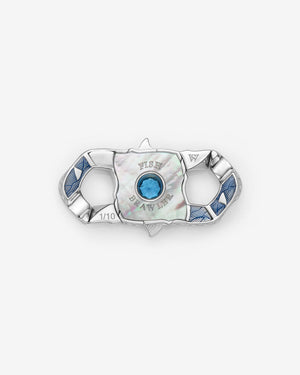 Stephen Webster Fish Brawler clasp in sterling silver with central aquamarine with blue enamel and mother of pearl back plate — back view