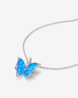 Side view of Fly By Night mini butterfly Black Opalescent Crystal Haze pendant necklace in 18k white gold
