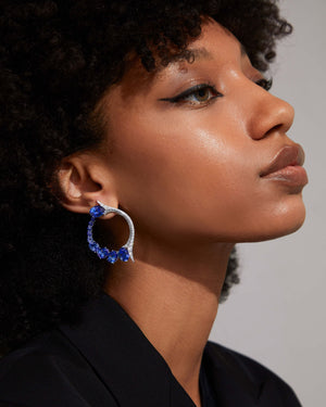 Forbidden Fruit Tanzanite Earrings worn on ear, luxury fine jewellery with colourful gemstone accents