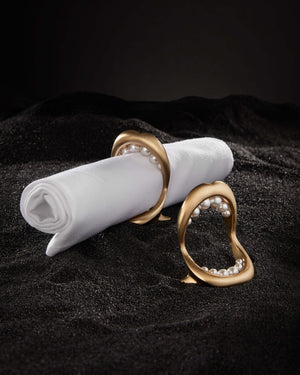 Gluttonny Napkin Rings styled in an elegant setting