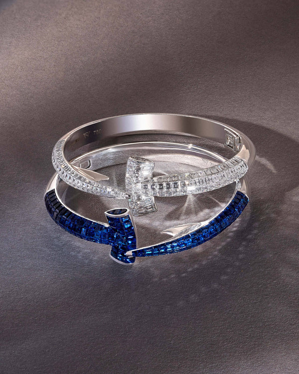 Close-up of white diamond detail on Stephen Webster Hammerhead Bangle in 18ct white gold, premium gemstone luxury jewellery