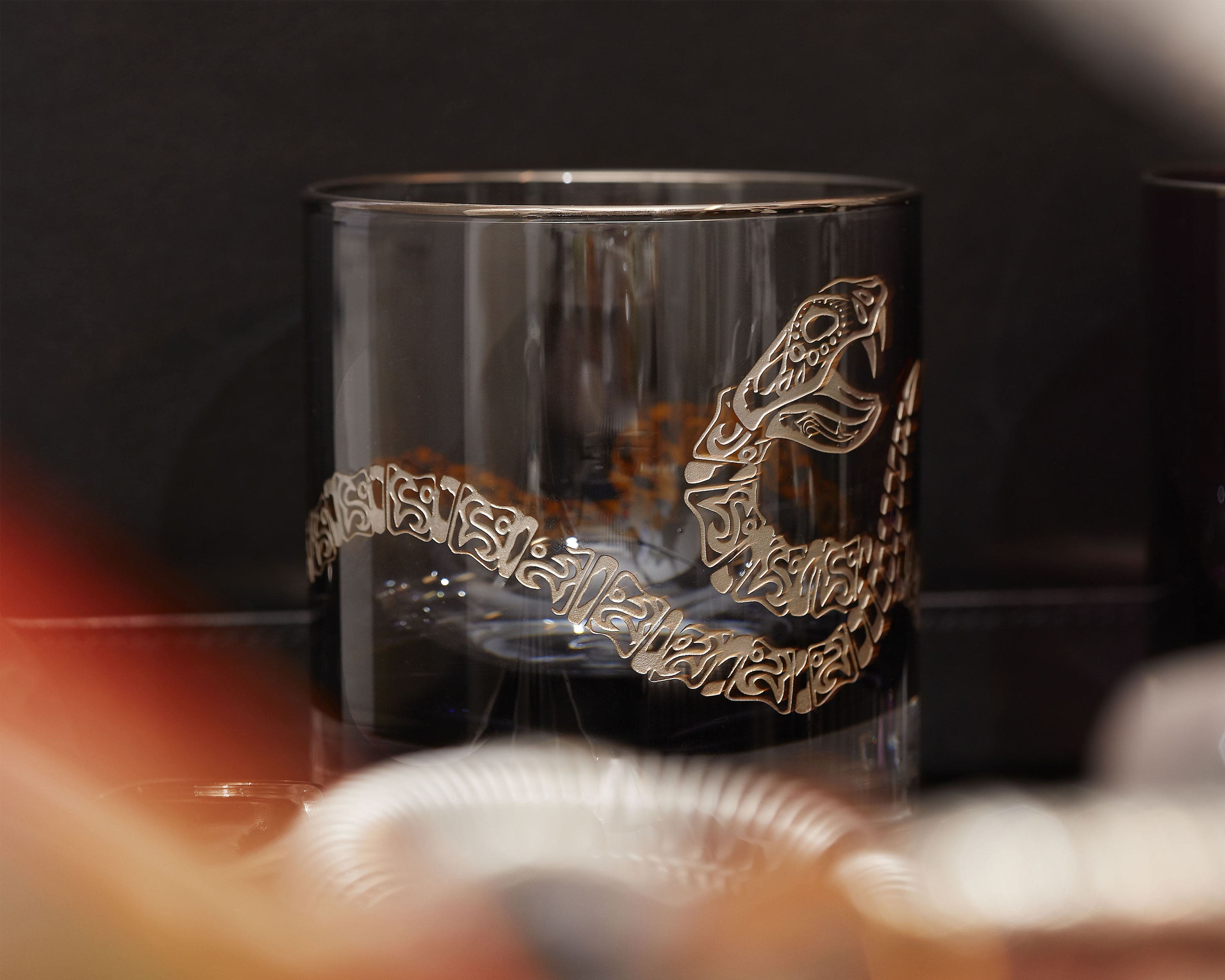 Close-up of Stephen Webster glassware detail being cleaned, illustrating care recommendations