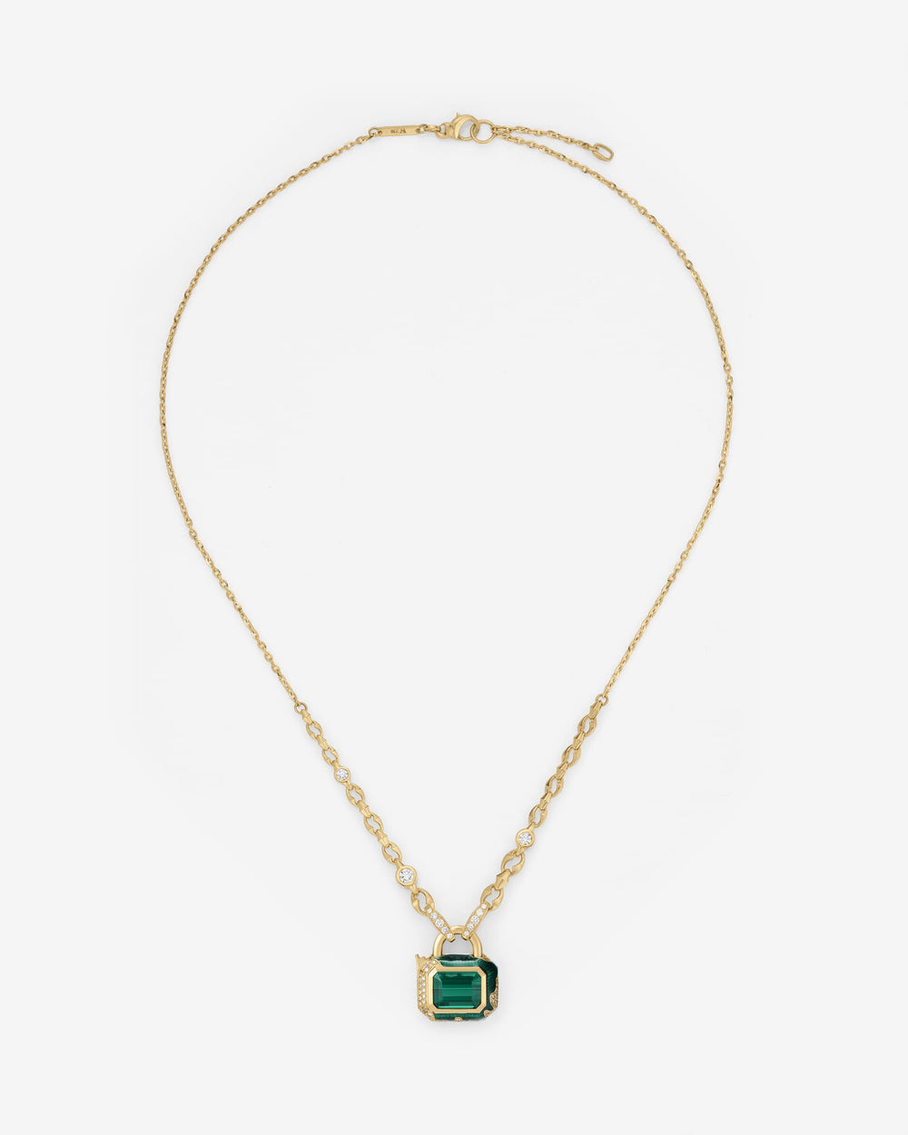 Full Bleed Interlock Pendant in 18 ct yellow gold with green tourmaline centre and graduated brown & white diamonds — front view
