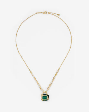 Full Bleed Interlock Pendant in 18 ct yellow gold with green tourmaline centre and graduated brown & white diamonds — front view