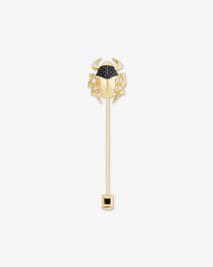 Stephen Webster Jitterbug Toro Beetle lapel pin in 18 ct yellow gold with black-diamond pavé and black spinel — front view