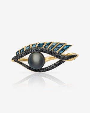 Love On The Nile cocktail ring in 18 ct yellow gold with central Tahitian black pearl, black diamonds, blue topaz baguettes and green tsavorites — front view