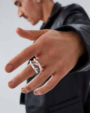 Macro close-up of Stephen Webster Double Thorn Sterling Silver Band on model’s hand showing detail and finish