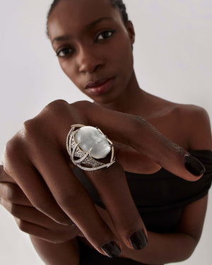 Underside view of Making Waves ring showing inner band and diamond-set spine structure