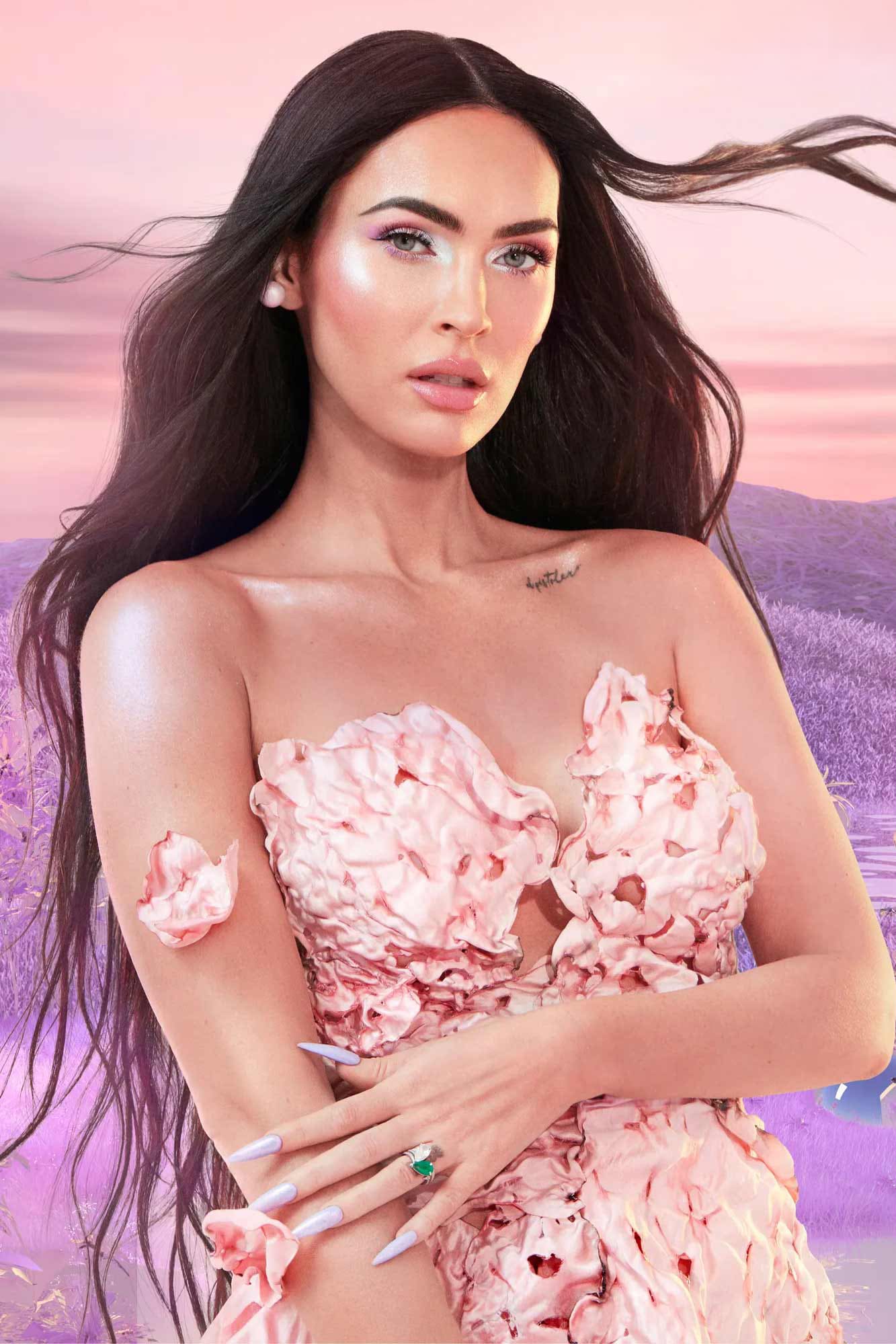 Megan Fox wearing bespoke Stephen Webster emerald and diamond engagement ring