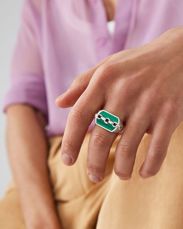 Male model wearing Stephen Webster Inline Malachite Signet Ring — luxury men’s jewellery styling
