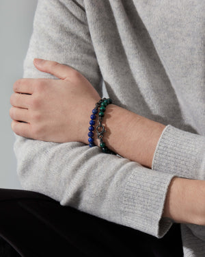 Male model wearing Stephen Webster Thorn Lapis Beaded Bracelet with black sapphire and lapis — men’s luxury jewellery styling
