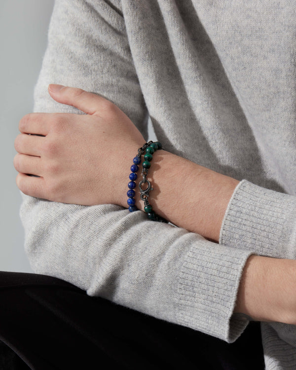 Male model wearing Stephen Webster Thorn Lapis Beaded Bracelet with black sapphire and lapis — men’s luxury jewellery styling