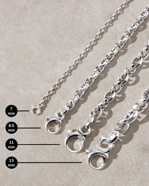 Close-up detail of the thorn-inspired polished sterling silver Stephen Webster bracelets, showcasing difference in sizes.