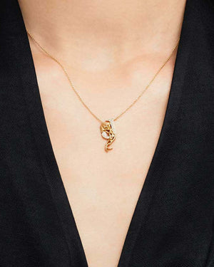 Model wearing Stephen Webster J is for Jellyfish initial necklace in 18ct yellow gold with diamonds, personalised luxury jewellery gift for her