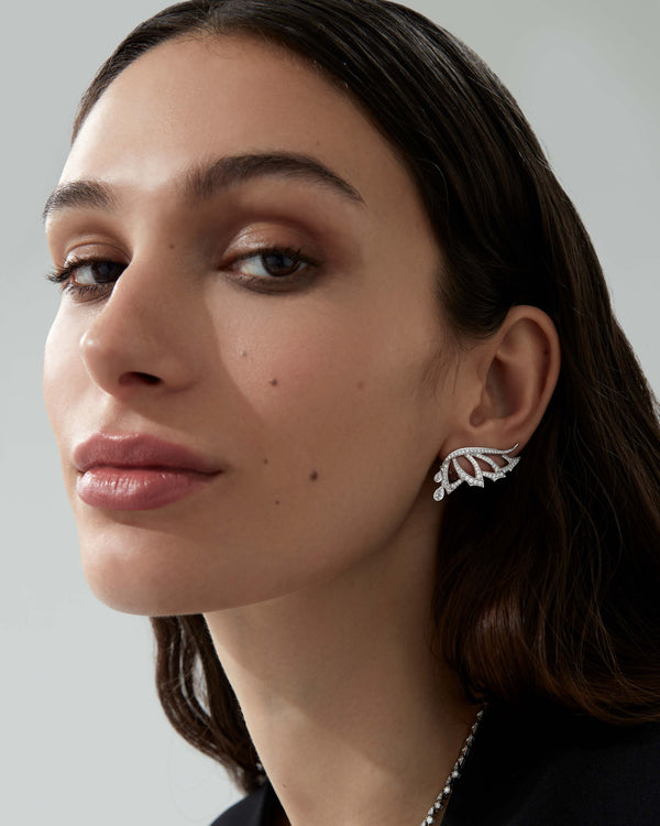Open Plume Ear Cuffs worn on ear showcasing elegant feather-inspired design