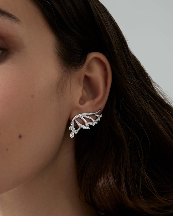 Open Plume Ear Cuffs worn on ear showcasing elegant feather-inspired design