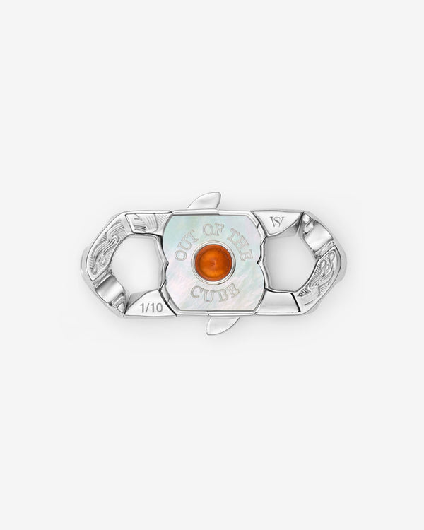 Stephen Webster Out of the Cube clasp in sterling silver with central fire opal, green & orange enamel and mother of pearl back plate — back view