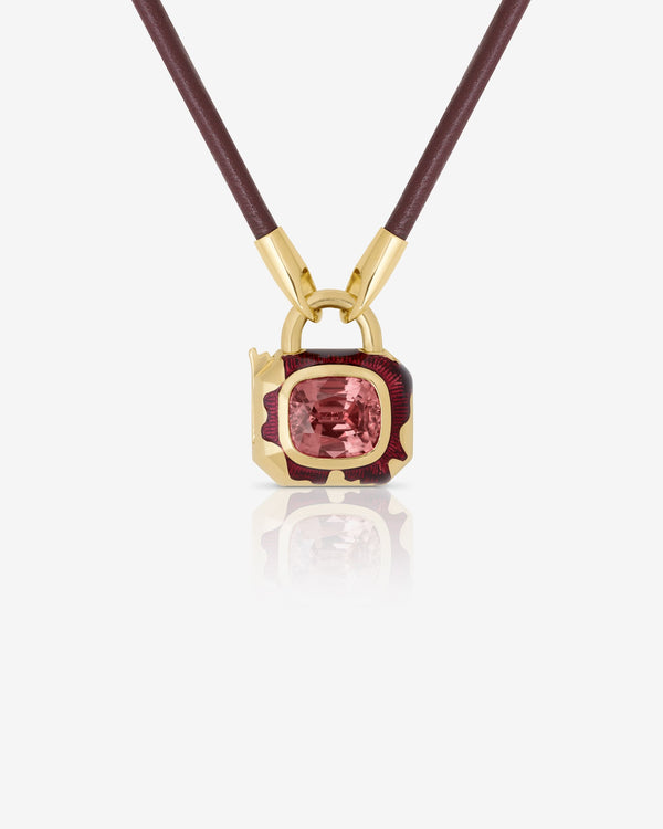 Pink Zircon Interlock pendant in 18ct Yellow Gold on leather by Stephen Webster, close up