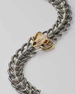 Stephen Webster Rams Head bracelet — 18 ct yellow gold skull-head centrepiece and polished silver/gold links, full view.