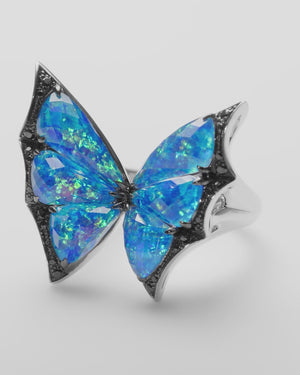 360 video of the blue faceted Crystal Haze quartz gemstone and white-gold setting on the butterfly ring