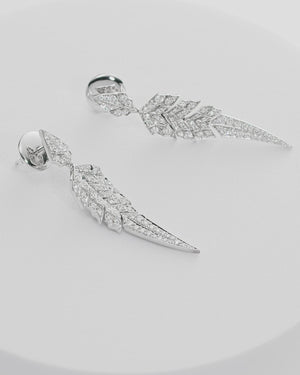 White gold and white diamond tail feather drop earrings in 18ct white gold — luxury feather jewellery with articulated feather motif