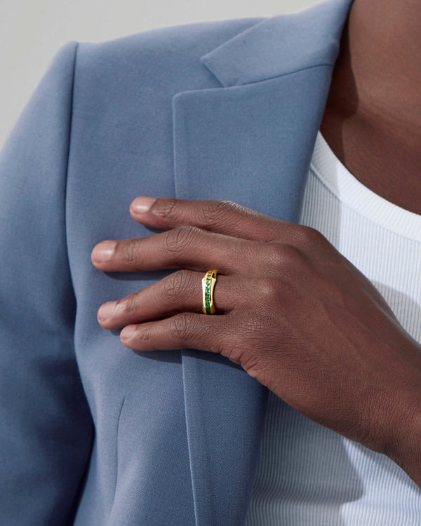 Quadrafoil rainbow baguette men’s wedding band worn on hand