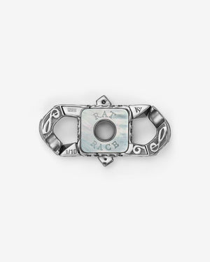 Stephen Webster Rat Race clasp in 18k yellow gold & sterling silver with black onyx, red garnet, emerald and mother of pearl back plate — back view