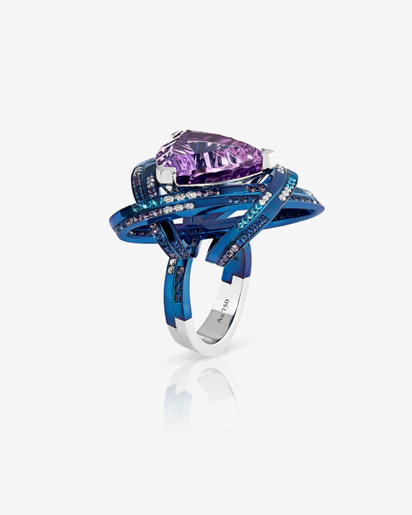 Rocket Girl ReBelles cocktail ring — blue titanium and 18 ct white-gold ring with central trillion-cut amethyst, Paraiba tourmalines, purple & blue sapphires and diamonds — front view