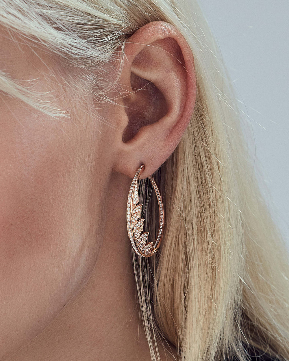Rose Gold Plume Hoop Earrings in 18ct rose gold with white diamond pavé and feather-inspired design