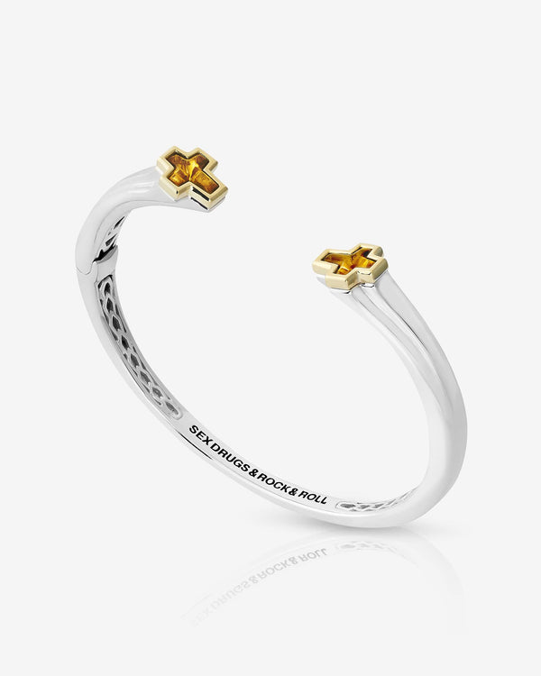 Stephen Webster Sex & Drugs & Rock & Roll bangle in sterling silver with 18 ct yellow-gold tipped citrine crosses — front view