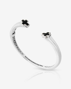 Stephen Webster Sex & Drugs & Rock & Roll silver bangle with black onyx inlay — front view