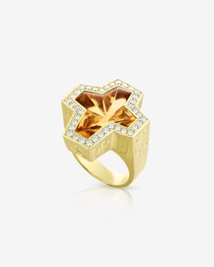 Stephen Webster Sex & Drugs & Rock & Roll cross-shaped ring in 18 ct yellow gold with bezel-set citrine — front view