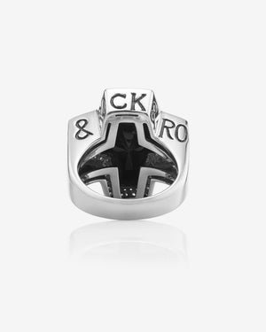 Stephen Webster Sex & Drugs & Rock & Roll cross-shaped ring in sterling silver with central black onyx cross and pavé diamonds — back view