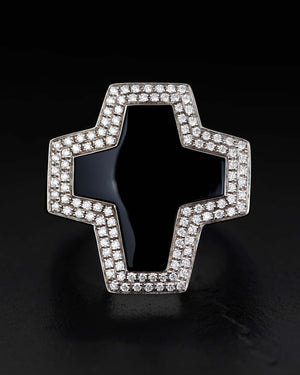 Close-up detail of black onyx cross and white-diamond pavé on Stephen Webster cross-shaped ring